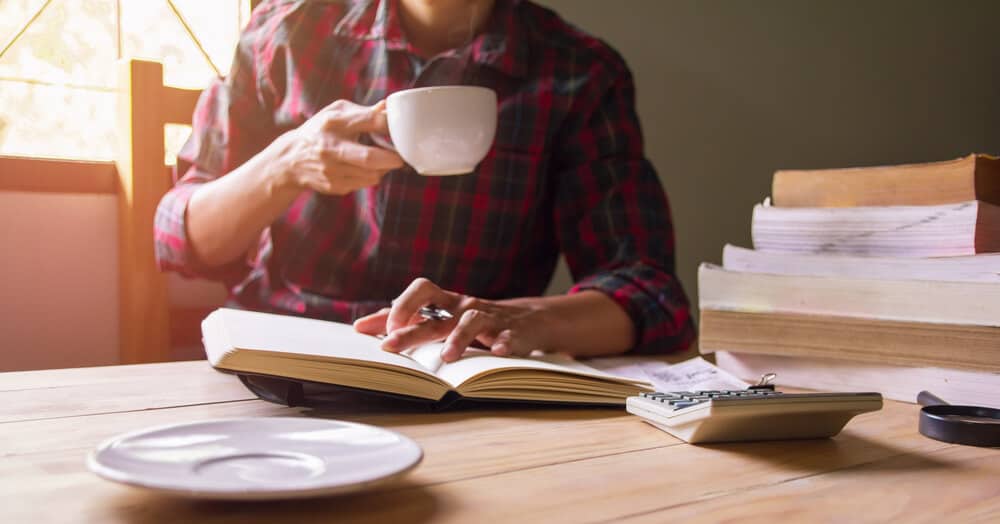 A collection of personal finance books on a table